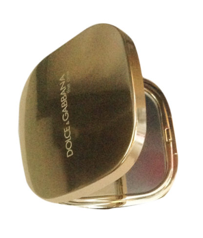 Gold Dolce & Gabbana compact makeup mirror