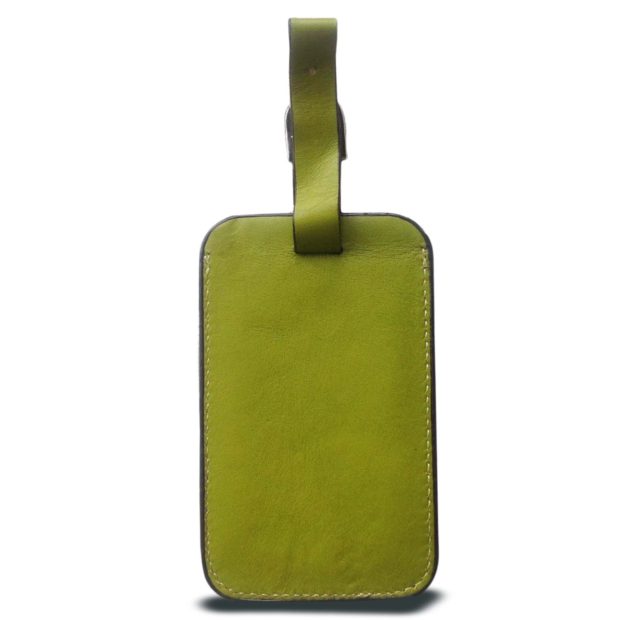 green luggage tags